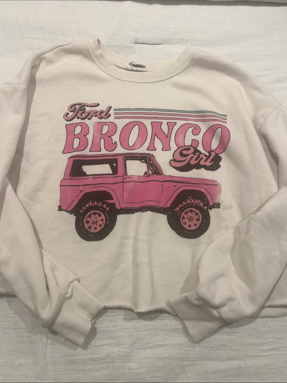 Ford Cream Crewneck Sweatshirt with Pink Bronco Graphic